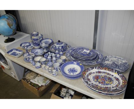 A quantity of blue and white china including Copland Spode "Italian" pattern, Victorian meat plates etc