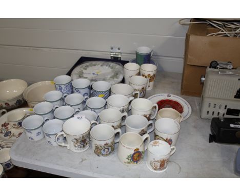A Royal Worcester cake plate, two Royal Commemorative beakers, other commemoratives and coffee mugs etc