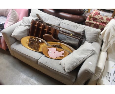 A grey upholstered sofa bed
