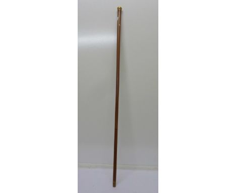 A French gold topped walking/swagger stick