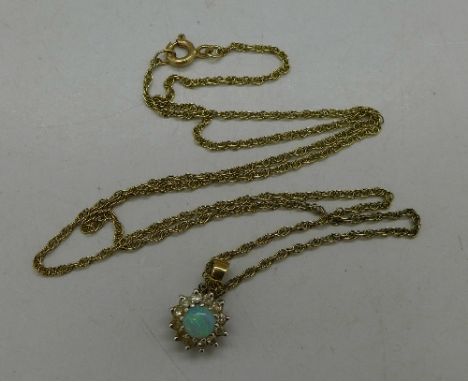 A 9ct gold and opal pendant on a 9ct gold chain, weight 2.6g