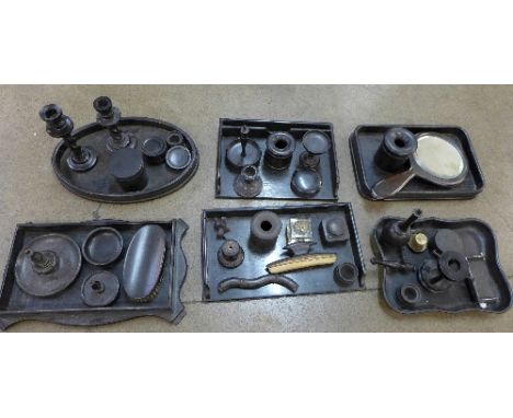 A large collection of ebony, desk stands, etc.