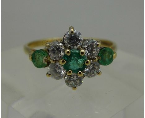 A 9ct gold, green and white stone ring, weight 1.9g, size N