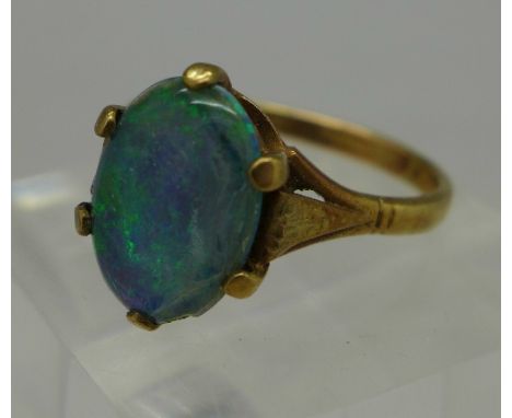 A 9ct gold and doublet opal ring, weight 3.9g, size S