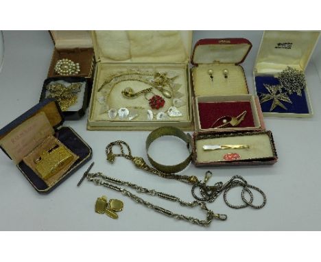 Costume jewellery including brooches, a mother of pearl necklace, an earring set, a Ronson lighter and 9ct gold earrings