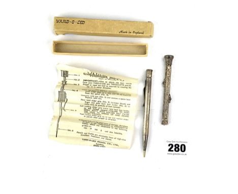 Boxed silver Yard-O-Led propelling pencil engraved M. Harrison and silver propelling pencil with purple stone top engraved F.