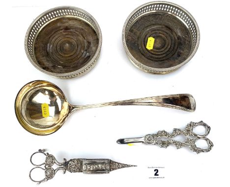 Assorted plated items including 2 bottle coasters, ladle, grape scissors and candle snuffer