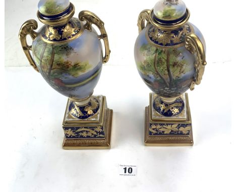 Pair of Noritake porcelain urns with lids - 12" high. Bases loose