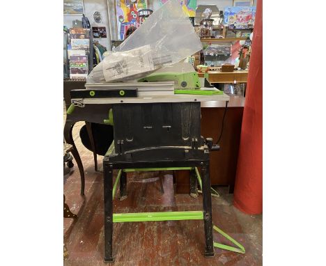 A Evolution bench saw and accessories, shipping unavailable 
