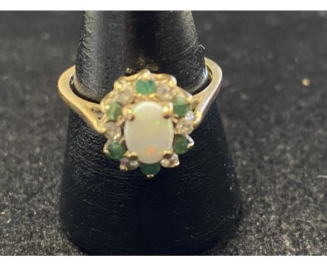 A 9ct gold, opal &amp; emerald ring. 2.46 grams 