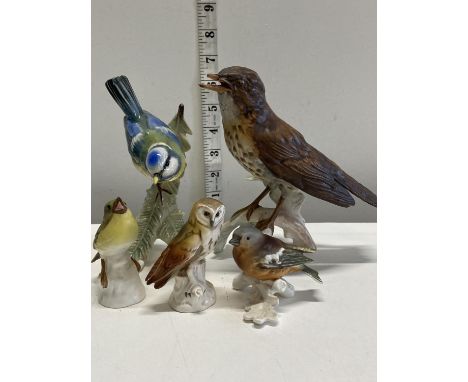 A selection of various Goebel bird figures. 