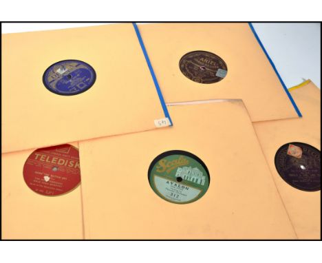 A collection of 10" vintage 78rpm records of various genres and labels tom include Zonophone, Duophone, John Bull Records, Te