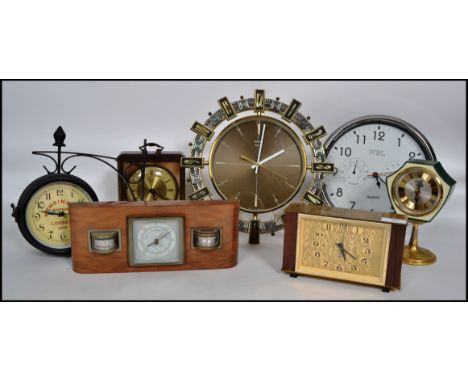A collection of retro clocks to include wall and mantel with such makes as Metamec, smiths etc. Measures 34cmx34cm.  