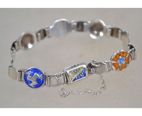 A believed Norwegian / Danish silver and enamel bracelet designed with flower heads in the manner of David Andersen. Unmarked