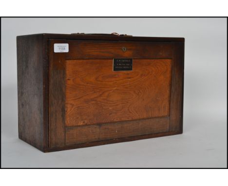 A vintage industrial 20th century Engineering chest comprising of an oak case and six drawers having a lockable fall front co