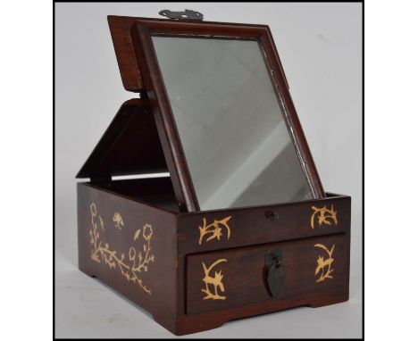 A vintage 20th century Chinese hard wood portable travelling metamorphic folding mirror box having a bone inlay animals and f