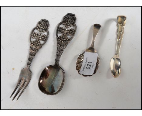 A silver hallmarked caddy spoon with shell shaped bowl bearing hallmarks for London 1905 makers&nbsp;Josiah Williams &amp; Co