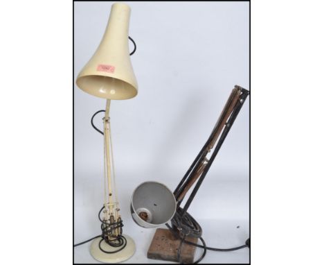 A retro mid century Herbert Terry anglepoise lamp on a circular base with conical shade together with another vintage anglepo