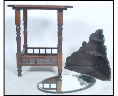 A Victorian oak centre table having a panel top raised on block and turn legs united at lower tier by a spindle gallery along