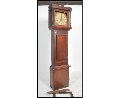 A 19th century Longcase grandfather clock by John Lampard of Leats ( Leeds ?) The oak case with painted face having subsidiar