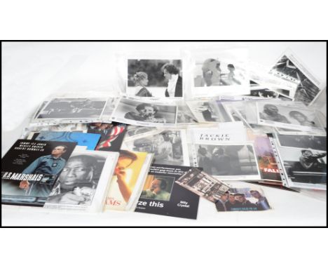 A collection of 20th century film press packs & photos for films to include; Sphere, Amistad, The Rainmaker, You've Got Mail,