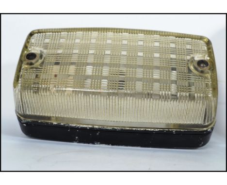 A group of vintage industrial bulk head lights to include two British made models by Coughtrie 