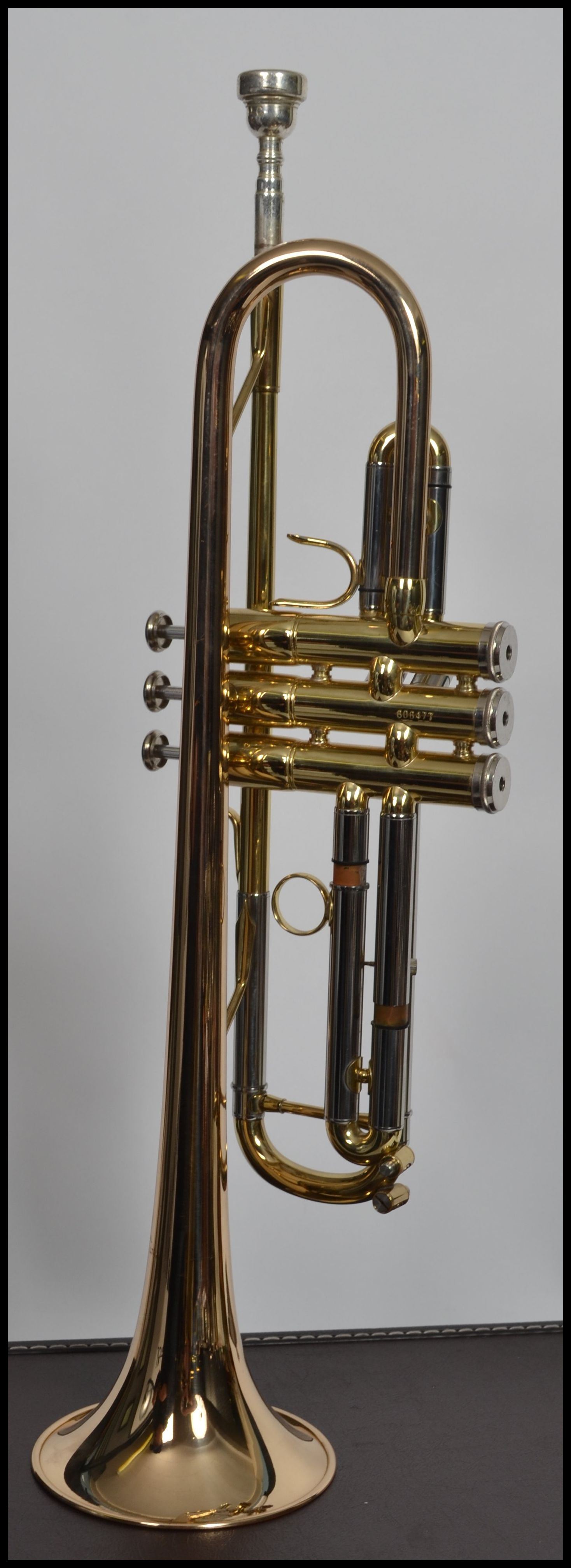 A vintage Jupiter brass three colour trumpet musical instrument No