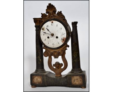 A 19th century Italian portico clock raised on a marble twin column stand with barrel movement and enamel dial with faceted h