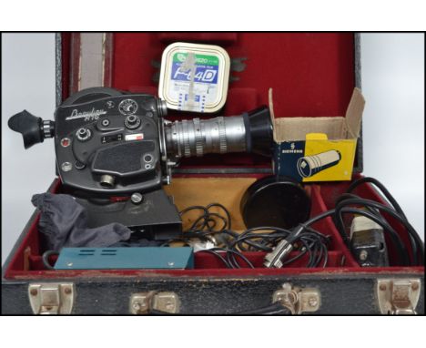 A vintage original early 20th century Beaulieu cine camera complete in the original case being marked to the camera itself
