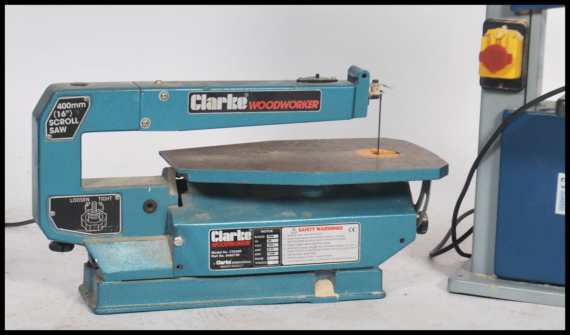 A hobbyist Seally Professional Bandsaw together with a Clarke