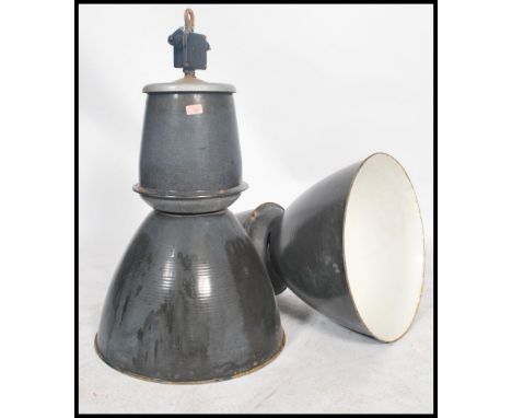 A pair of large vintage industrial 20th century factory black enamel ceiling lights. Each  retaining the original fixture poi