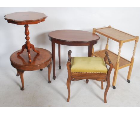 A collection of furniture to include a 1920's oak barleytwist trolley, a mahogany pedestal lamp table, an Edwardian mahogany 