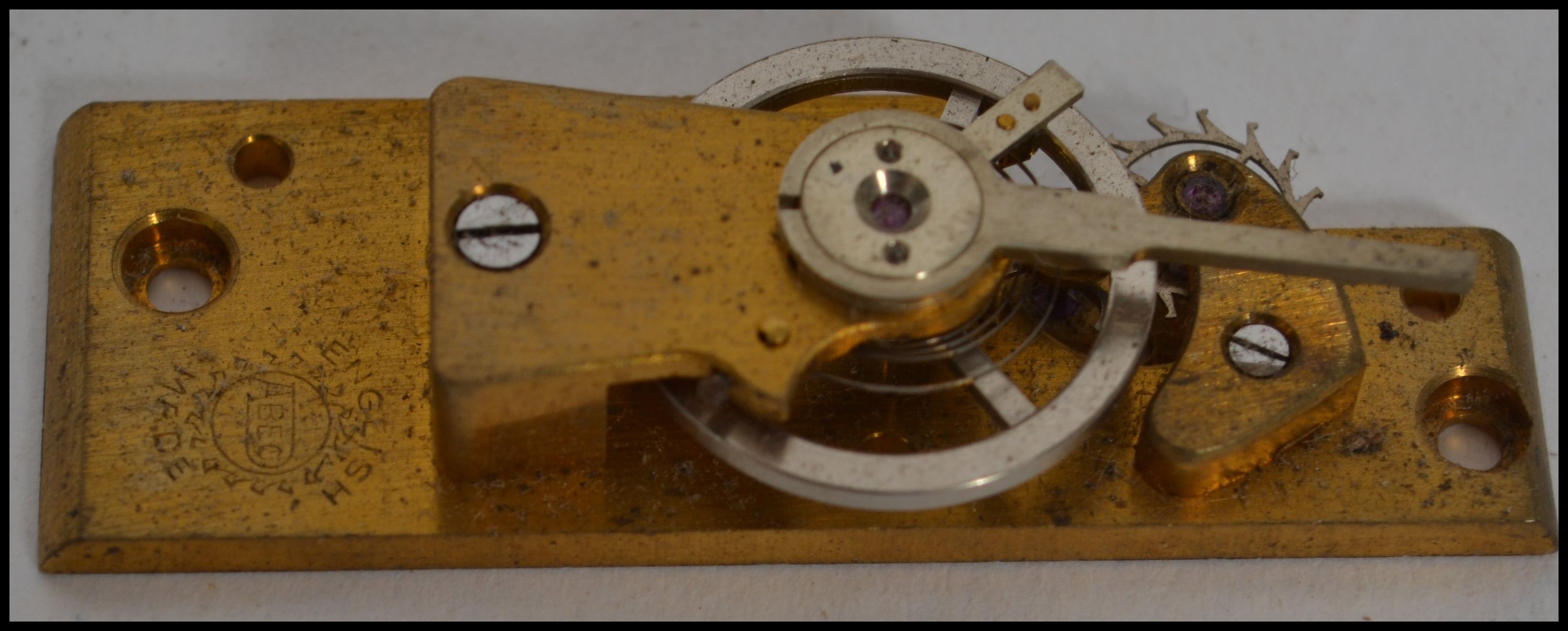 Two boxes of vintage clock 8 day platform escapements to include French