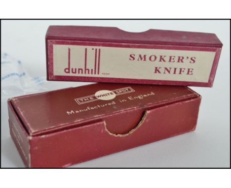 A vintage 20th century Dunhill cigar holder cheroot of tapering form complete in the original box together with a pipe taper 
