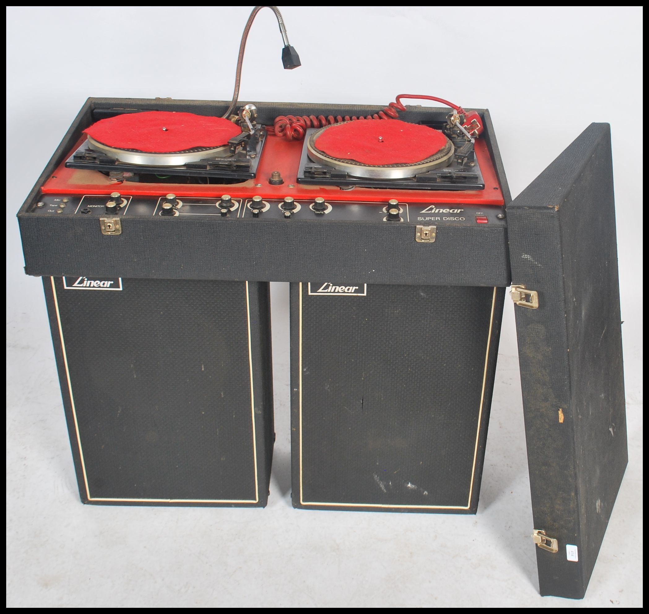 A vintage DJ record deck system and speakers consisting of two Garrard