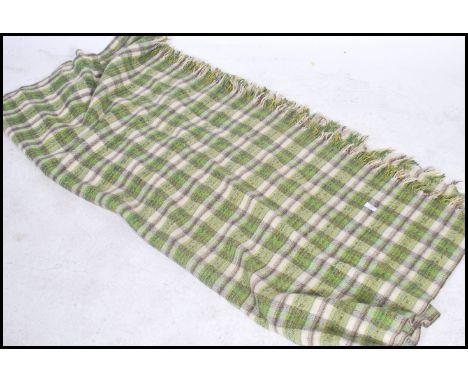 A vintage mid 20th century Irish  woven tartan  woolen blanket having a green and white tartan design, of good size in good o