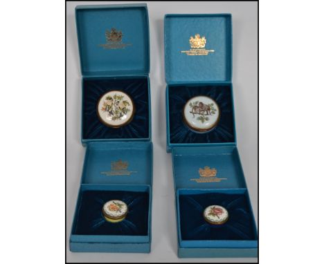  A group of four enamel pill boxes by Crummles complete in original boxes.