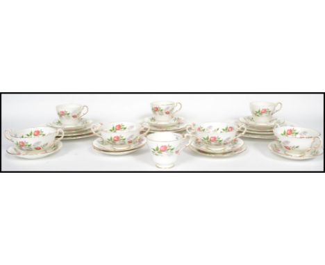 A vintage 20th century chintzy pattern part tea, soup and dinner service by Paragon in the fragrance pattern consisting of cu