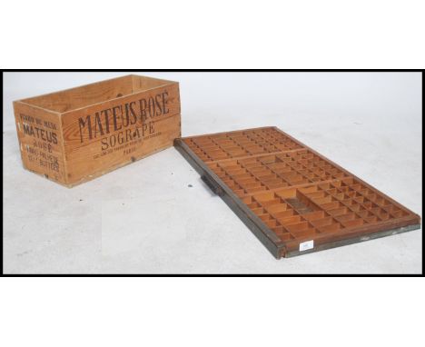 A 19th century printers tray together with a vintage Rose wine advertising wooden crate bearing notation to the side.