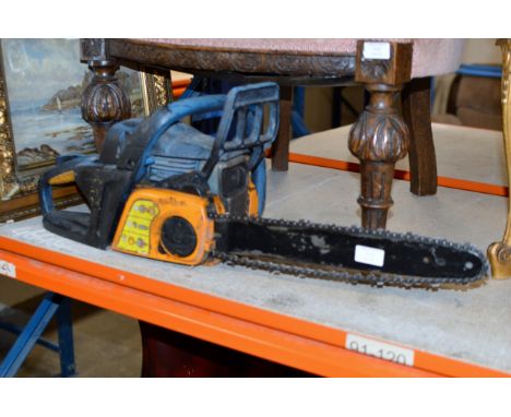 AN ENGINE CHAINSAW    
