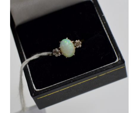 A LADIES PLATINUM SET OPAL &amp; DIAMOND RING ON 18 CARAT YELLOW GOLD BAND - APPROXIMATE WEIGHT = 2.6 GRAMS    