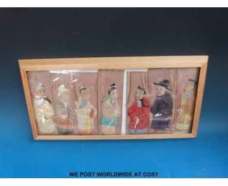 Seven 18thC Chinese stumpwork embroideries all of Chinese men, in light wood frame. 