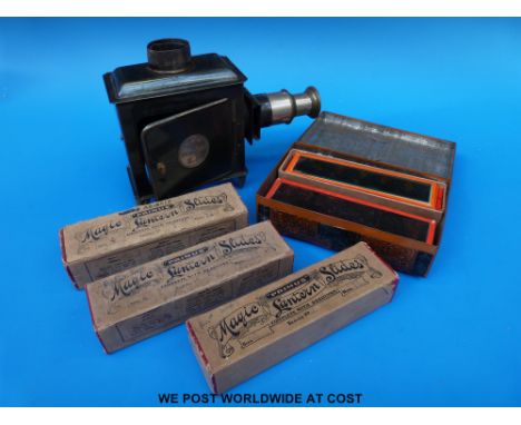 A collection of coloured magic lantern slides, mainly of children's stories and nursery rhymes and a magic lantern 