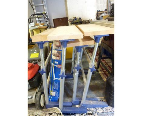 Four adjustable woodworking props/benches and two boxed Kinzo trestles 