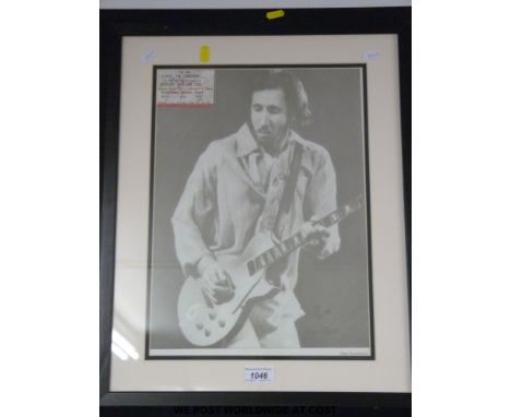 A framed picture of Pete Townshend (19" x 23") together with a concert ticket for 'The Who' at Ashton Gate Stadium on 28 June