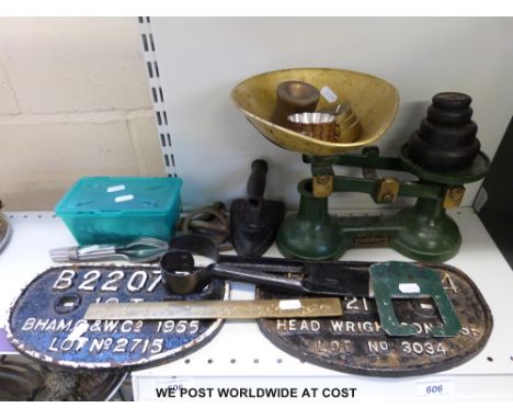 Two railway wagon plates together with a set of kitchen scales, iron, coins etc 