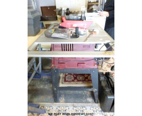 A Rexon BT2500A tablesaw together with Nutool bench grinder with spare discs and instruction manual, model no. CH152