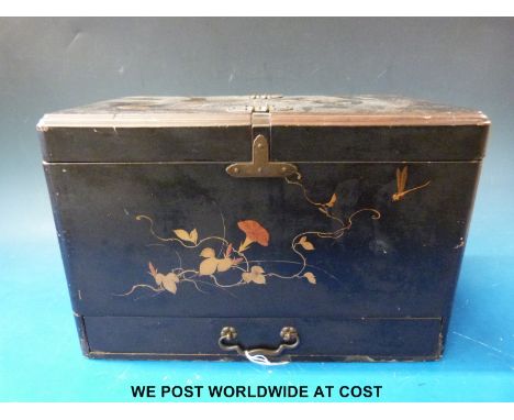 A Japanese lacquer tea caddy with gilt decoration and drawer below, width 30cm