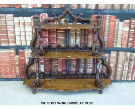 A 19thC carved mahogany three-tier whatnot or wall shelf (width 79cm)