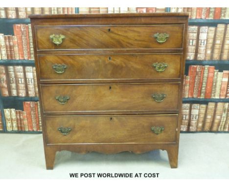 A Georgian mahogany straight chest of four graduated drawers raised on bracket feet (w92 x d46 x h103) 